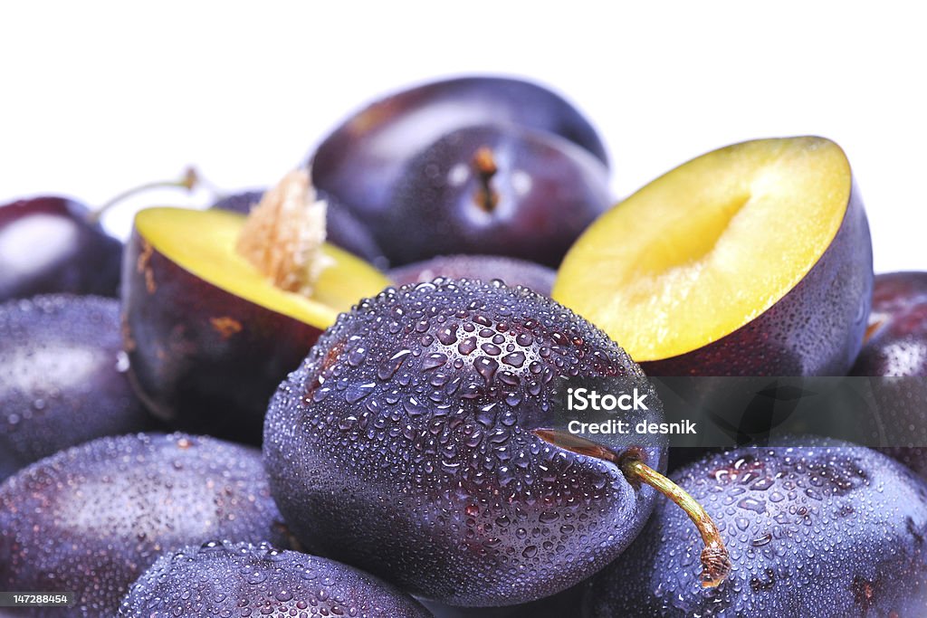 wet plums Close up of wet plums Agriculture Stock Photo