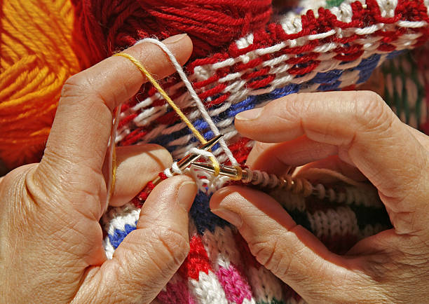 istock Knitting on a Colorful Woolen Sweather 147288458