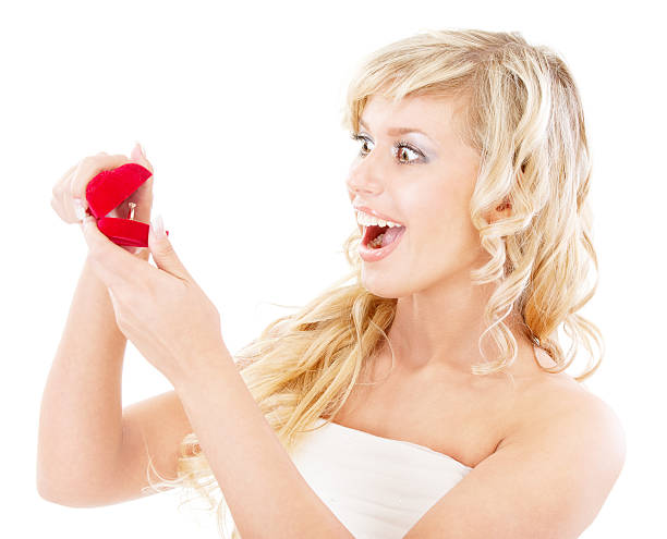 istock Girl with surprise looks at box wedding ring 147288480