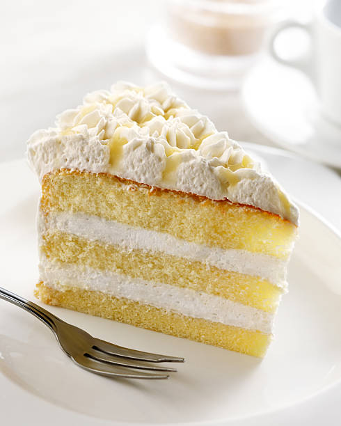 istock Slice of three-layer sponge cake with fresh cream 147288527