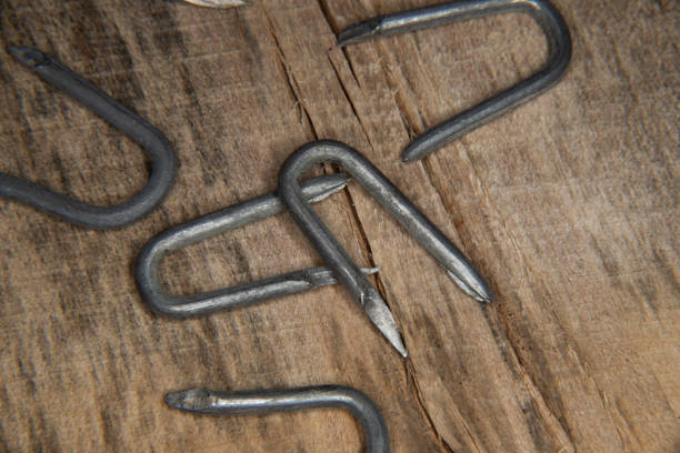 istock pile of heavy barbed wire staples for construction and carpentry 1472890343