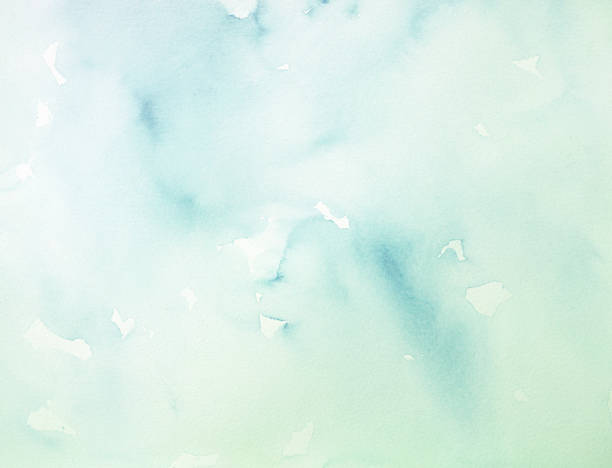 istock Abstract soft green watercolor background on a white paper. 1472896331