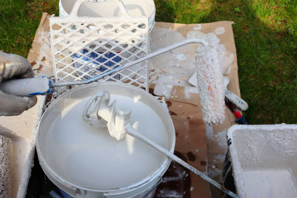 istock Painting, tools and paint mixing 1472897942