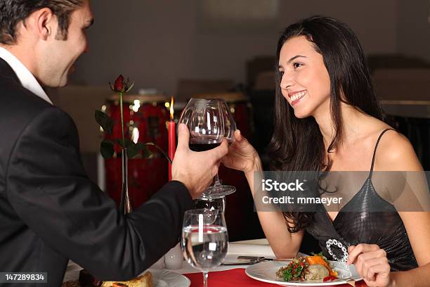 Romantic Couple Having Dinner Stock Photo - Download Image Now - Dating, Red, Adult