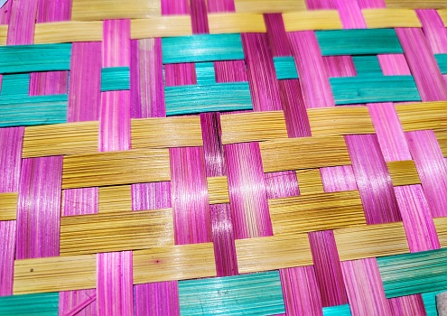 a colorful bamboo woven ornament