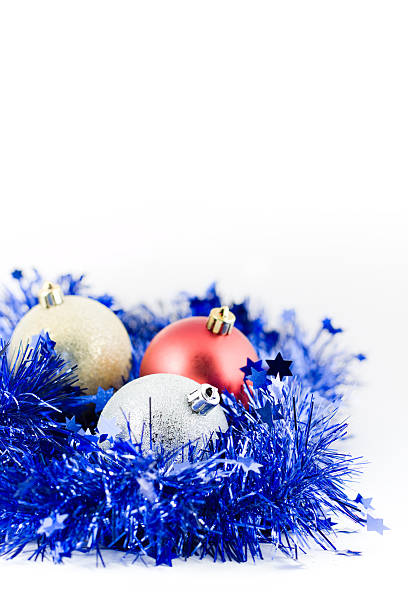 istock christmas colored balls in blue tinsel vertical orientation 147290045