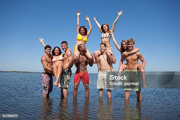 Fun At The Beach Stock Photo - Download Image Now - 20-29 Years, Beach, Beach Party