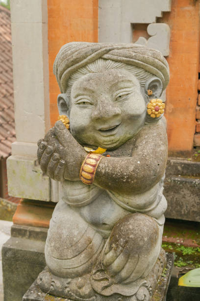 istock balinese stone statue in the garden 1472906530