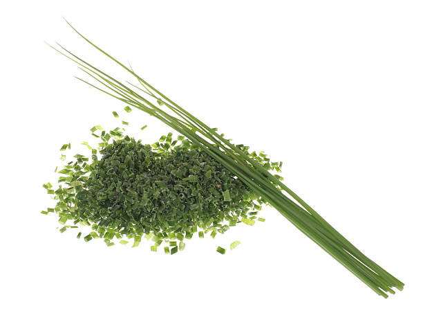 istock Chives chopped fresh and frozen isolated on white background 147290713