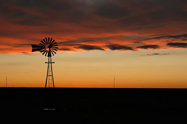 oklahoma windmill at sunset.