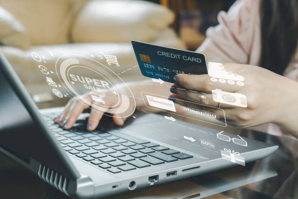 istock Asian young woman's resting and using credit card for online shopping and browsing internet with laptop. Entrepreneur or Businesswoman working from home. Online concept. 1472908666