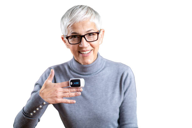 istock Senior Woman Using Pulse Oximeter, Measuring Oxygen Saturation. Transparent Background 1472909981