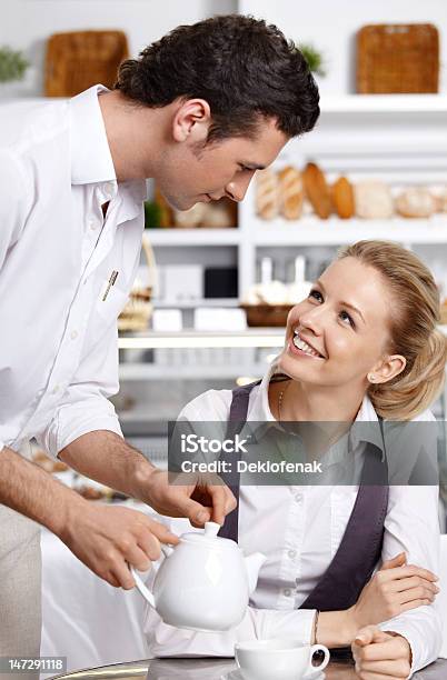 The Waiter Works Stock Photo - Download Image Now - 20-29 Years, Adult, Beautiful People