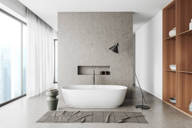 istock Front view on bright bathroom interior with panoramic window, bathtub 1472912181