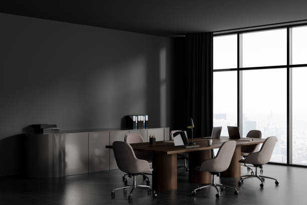 istock Grey business room interior with meeting corner and window. Mockup wall 1472912277
