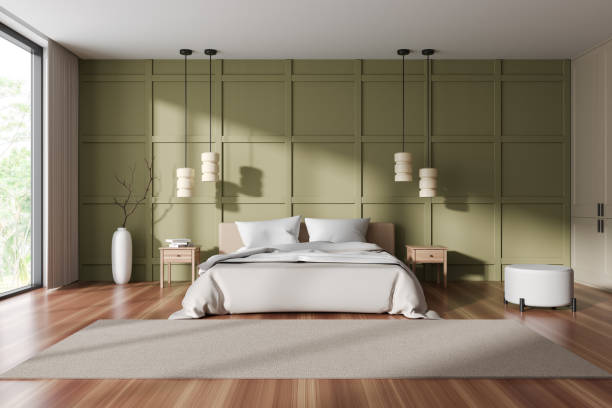 istock Front view on bright bedroom interior with bed, bedsides 1472912334