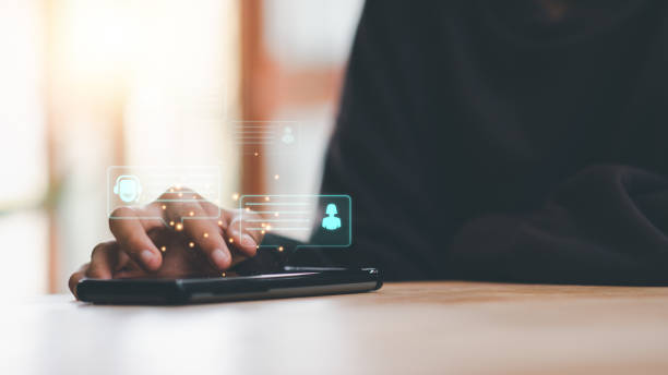 istock Customer support concept,online communication and service,business information hotline, modern technology assistance,problem solving and advice,Customer contact online customer support with smartphone 1472912385