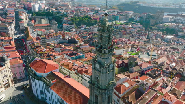 Drone shot of the red tile roofs of old buildings in the coastal city of Porto, Portugal
