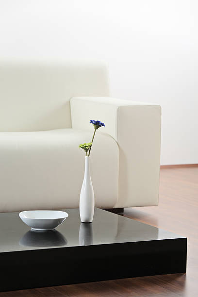 istock Vase and flower at table 147291591