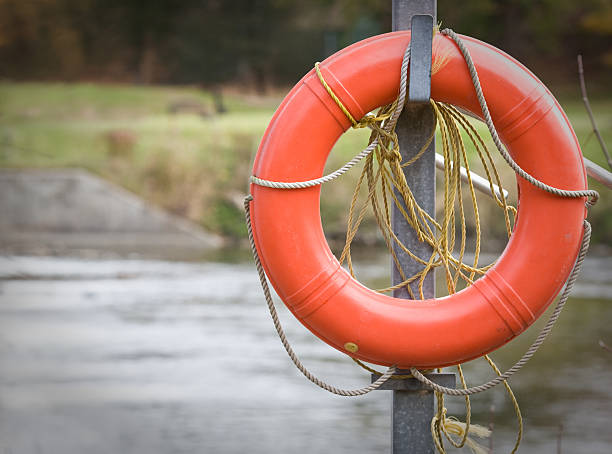 Life preserver  by dangerous river stock photo