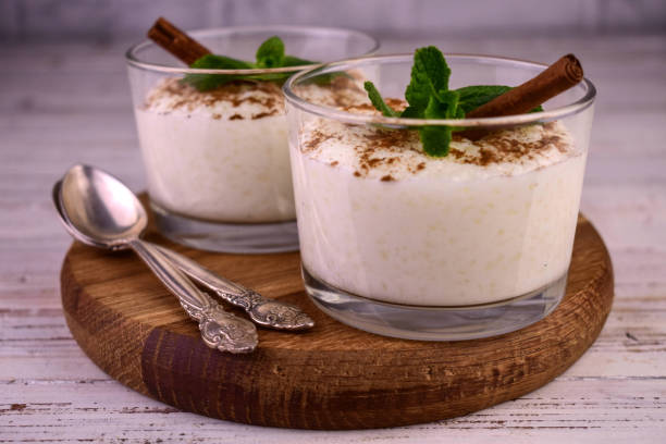 istock Rice pudding with cinnamon in glasses.Close-up. 1472919499