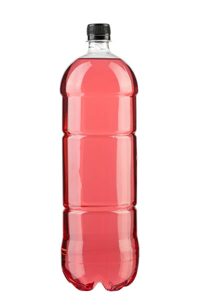 istock Energy drinks with different flavors isolated on white background. Plastic bottle with red liquid. 1472920179