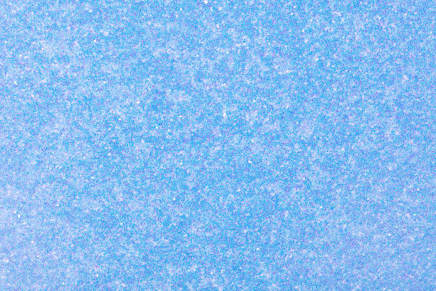 istock Light blue holographic glitter for christmas event celebration card design background concept. Shiny dust sparkle festive decoration effect, holiday texture, navy wallpaper, happy new year 2024, 3d. 1472922252