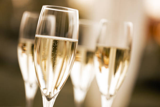 Sparkling wine Festive photo of sparkling wine in glasses champagne bubbles stock pictures, royalty-free photos & images