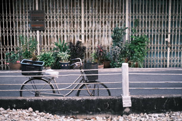 istock Bicycle on the side street with railway 1472925055