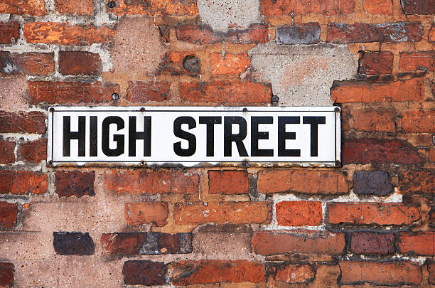 istock Rusty Metal High Street Road Sign On Brick Wall 147292547