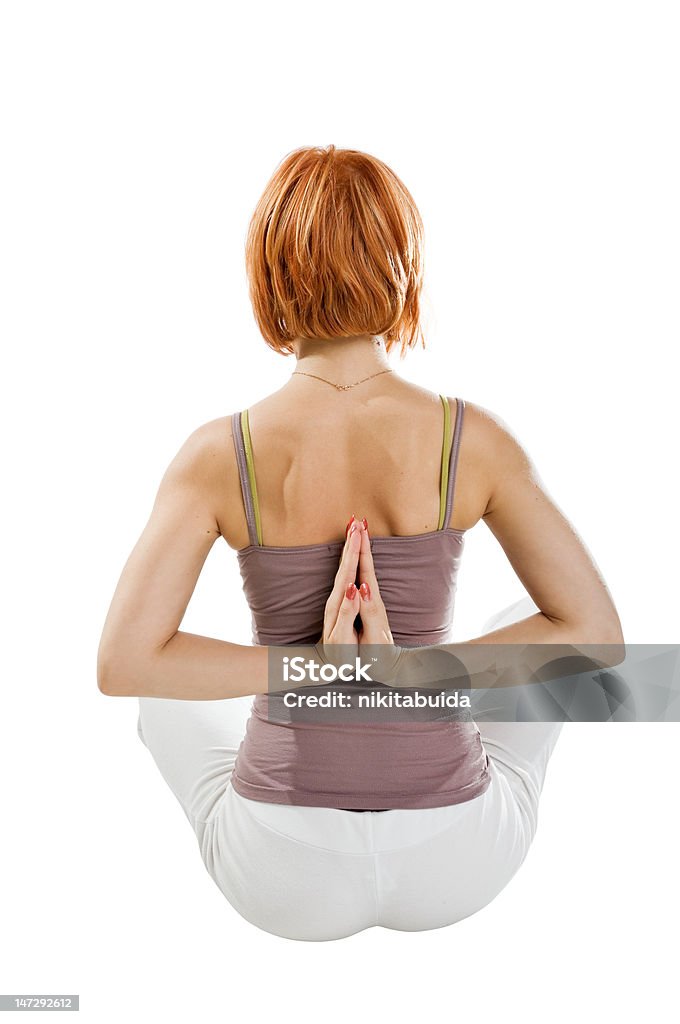 Girl practicar yoga en fondo blanco - Foto de stock de 20-24 años libre de derechos