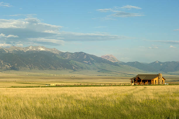 Montana ranch Ranch house with mountains on background in Montana, USA prairie stock pictures, royalty-free photos & images