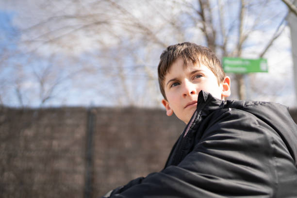 istock Portrait of handsome young boy relaxed and looking with confidence. copy space 1472933908