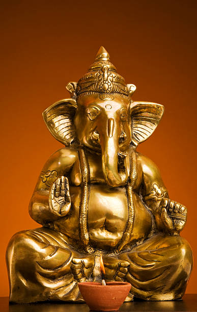 istock Golden Idol of Lord Ganesh Blessing Everyone 147293419