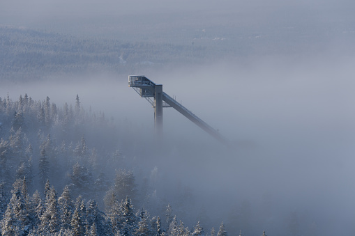 Ounasvaara ski jumping hill in Rovaniemi, Finland, surrounded by fog