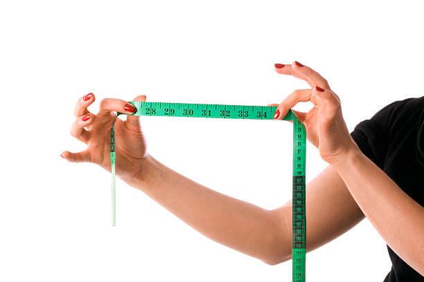 istock Woman with Tape Measure 147293646