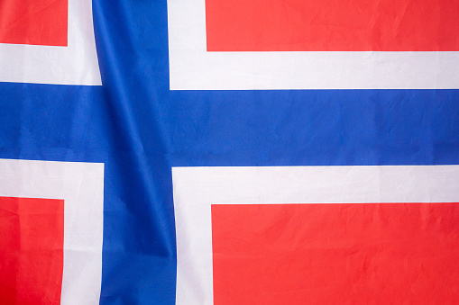 Full frame of the Norway flag. Top view. Flat lay. Close-up photo.