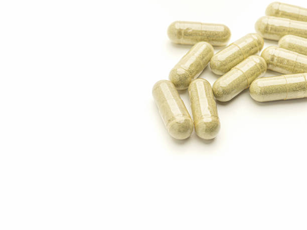 istock Flat lay of Andrographis Paniculata capsules isolated on white background. 1472937458
