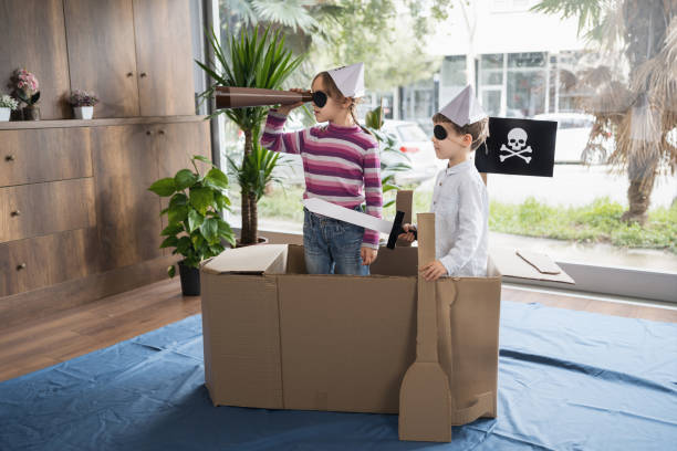 istock Children playing pirates roleplay game at home 1472937498