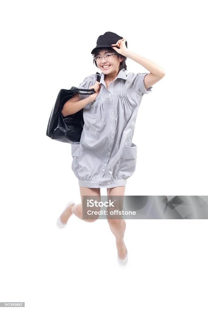 Jovem adolescente pulando, vibrante e pulando de volta às aulas - Foto de stock de Mulheres royalty-free