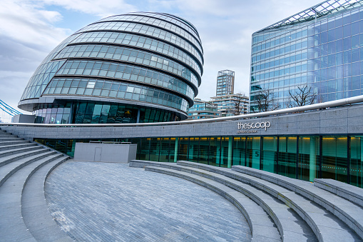 London, England - February 10, 2023: Wide view of More London from the Scoop, a business and tourist destination next to the River Thames