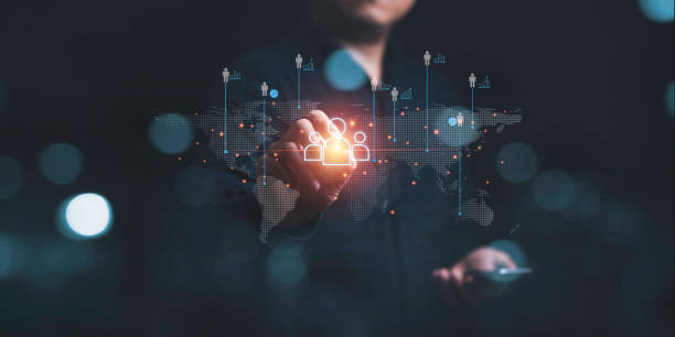istock Businessman touching virtual human icon on world map for business CRM or Customer Relation Management and customer service concept by use social media technology. 1472943052