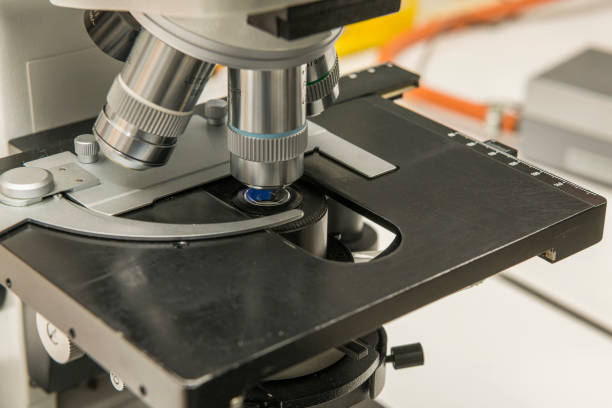 istock Detailed view of a microscope in a laboratory 1472943264