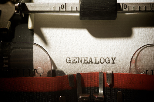 Genealogy word written with a typewriter.