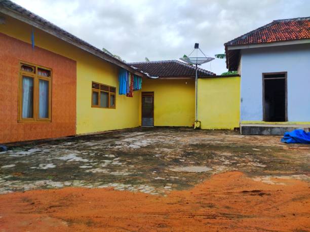 istock A house with yellow and gray wall paint 1472944246