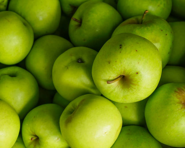 istock Green apples at rural market 1472944425