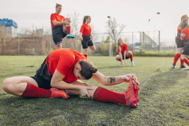 istock Female rugby team training outdoors 1472944727