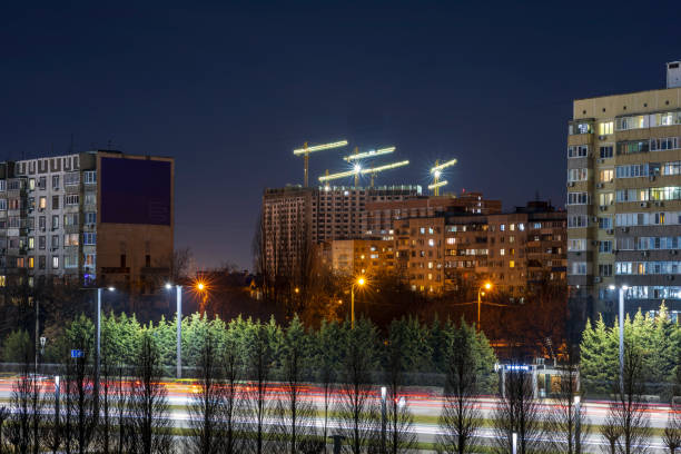 istock light paths on the background of the night city 1472949703