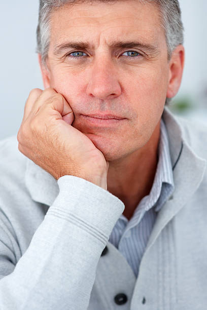 istock Close-up of a mature man thinking 147295129