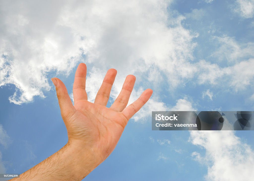 Hand reaching sky Adult Stock Photo